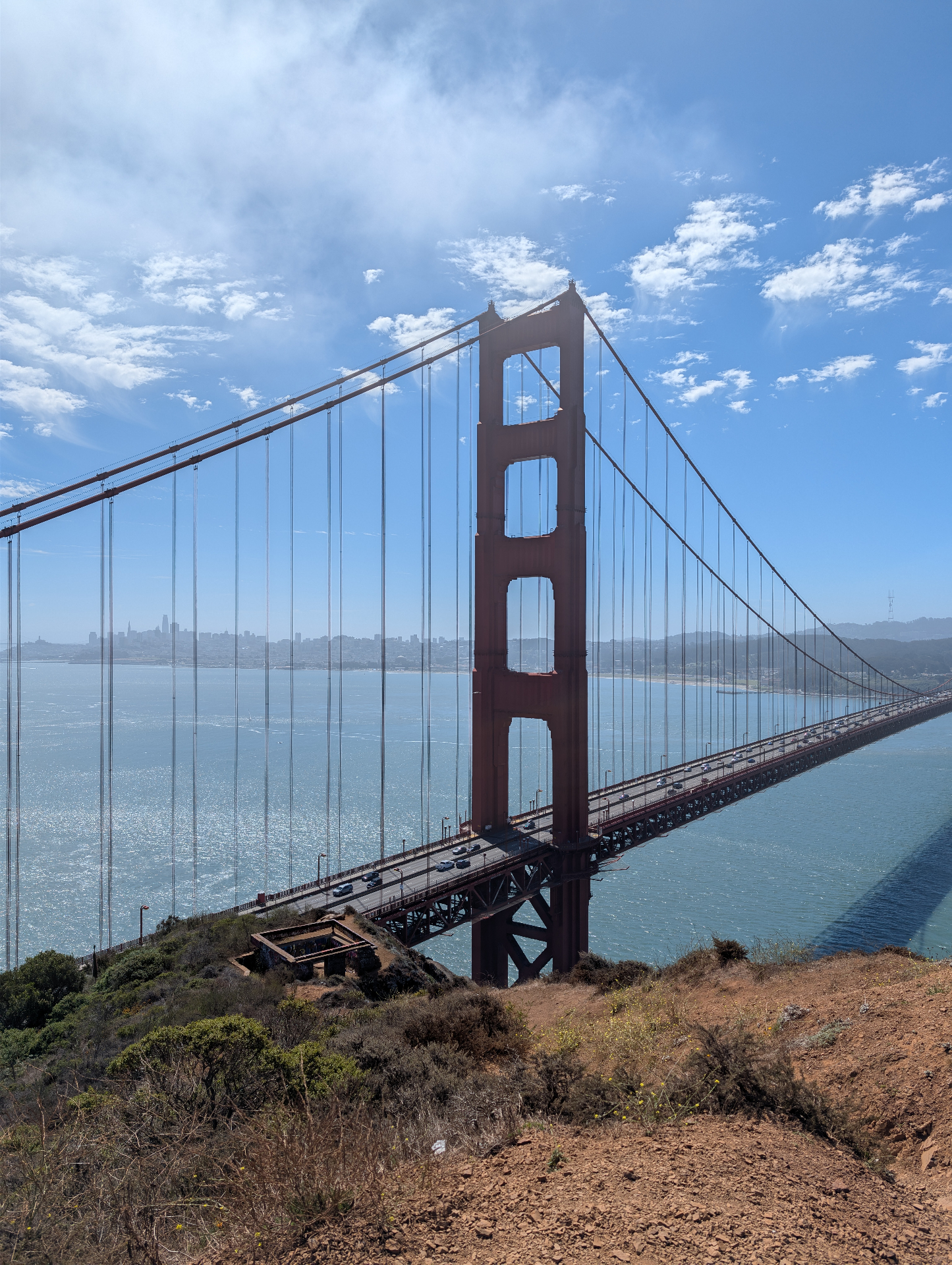 Golden Gate Bridge beneath a bright blue sky