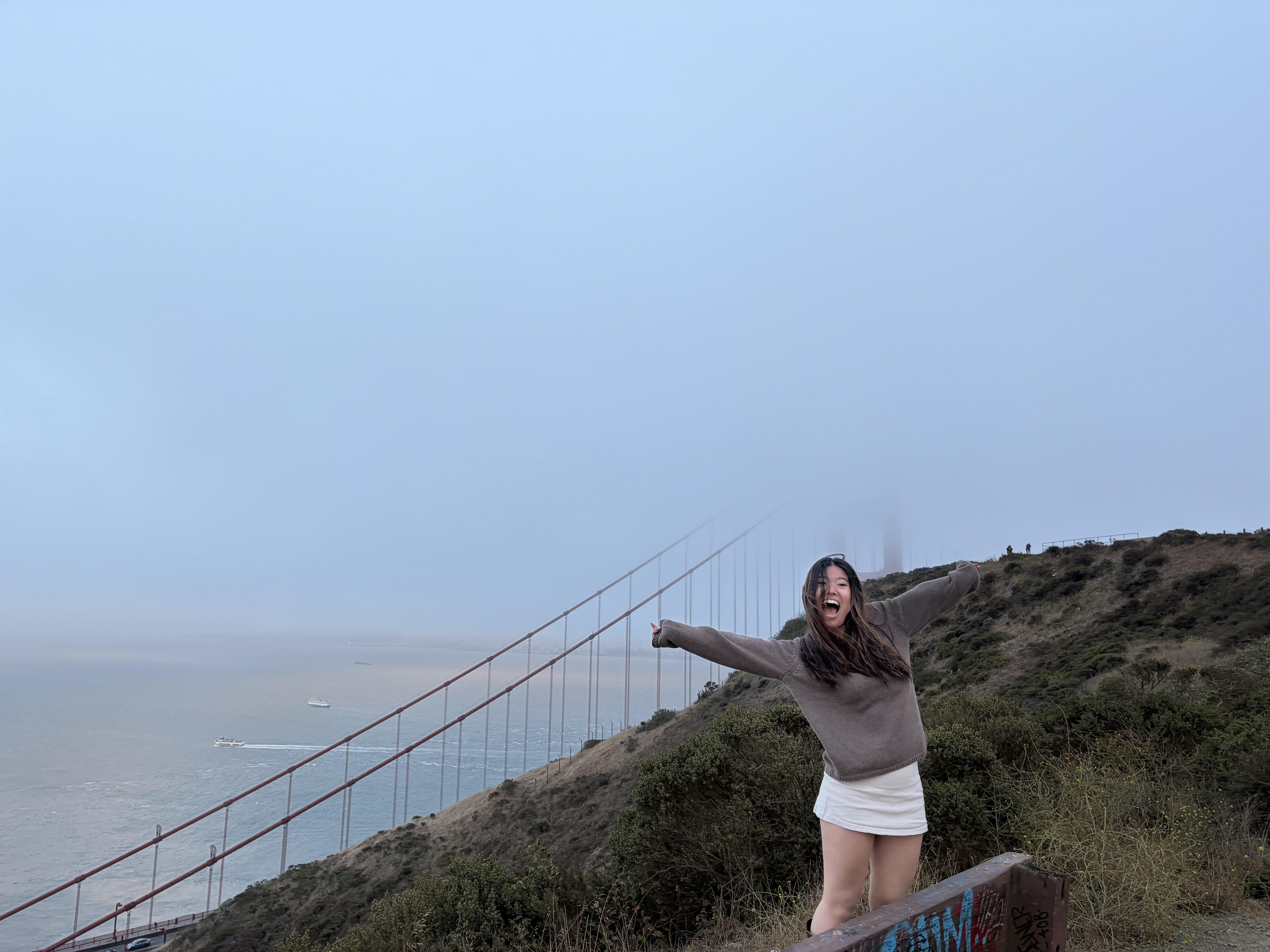 Teagan Yuen in front of the Golden Gate Bridge